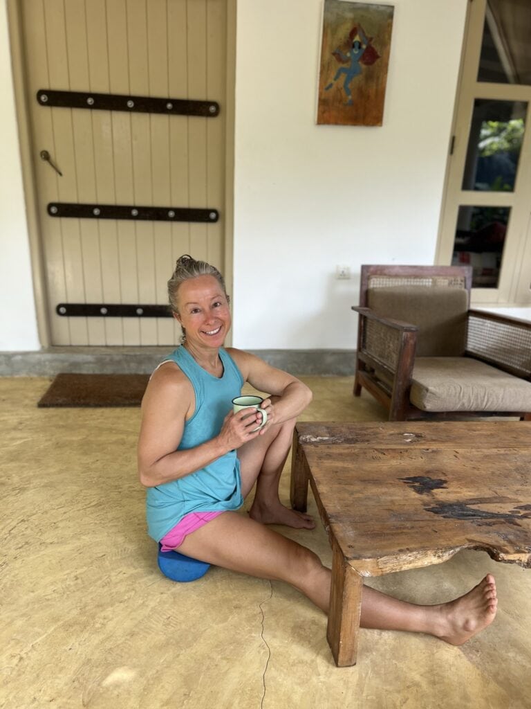 Woman sitting on the floor.