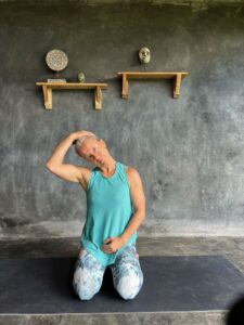 Woman engaging in neck exercise movements to alleviate neck pain and promote relief and flexibility.