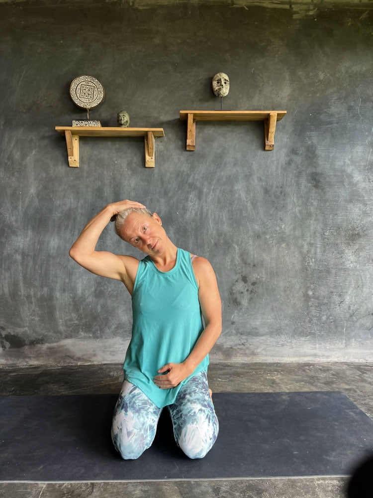 Woman engaging in neck exercise movements to alleviate neck pain and promote relief and flexibility.